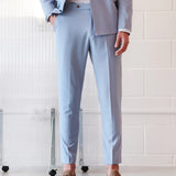 Calças de ganga de alfaiataria com fivelas e corte afunilado.