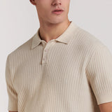 Polo de malha com tranças