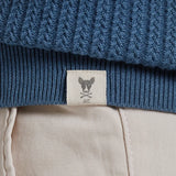 Polo de malha com tranças