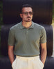 KNITTED POLO SHIRT WITH CABLED KNIT